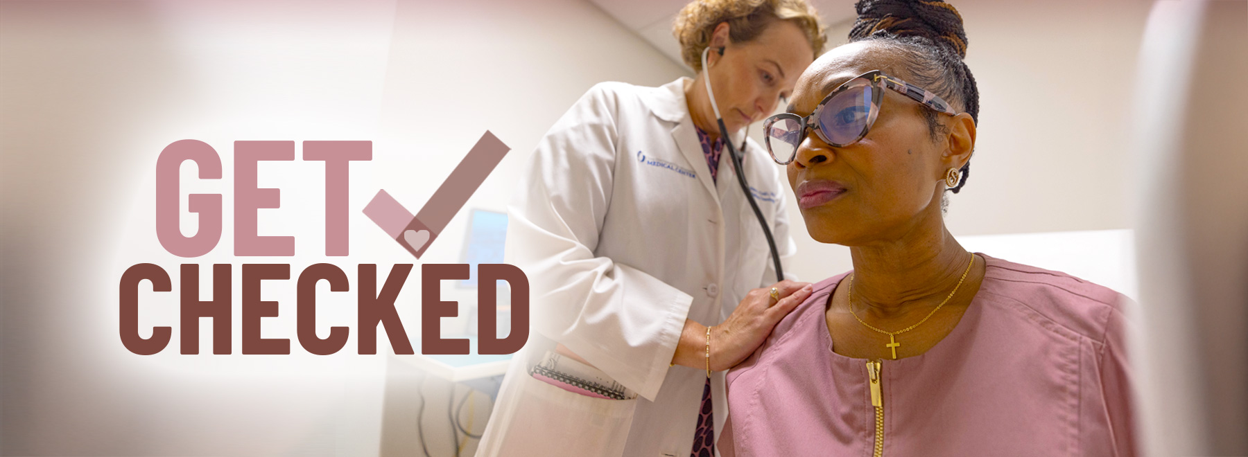 A woman consulting a healthcare professional about breast cancer screening and prevention measures.